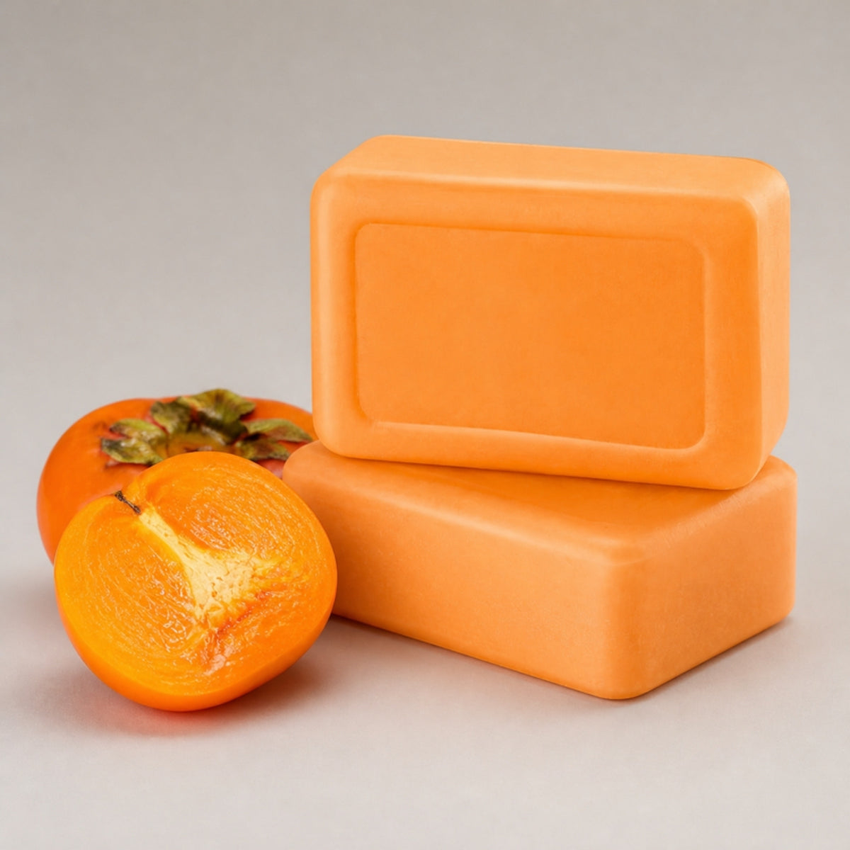 Vanigo Fresh Persimmon Deodorising Soap bars with a halved persimmon