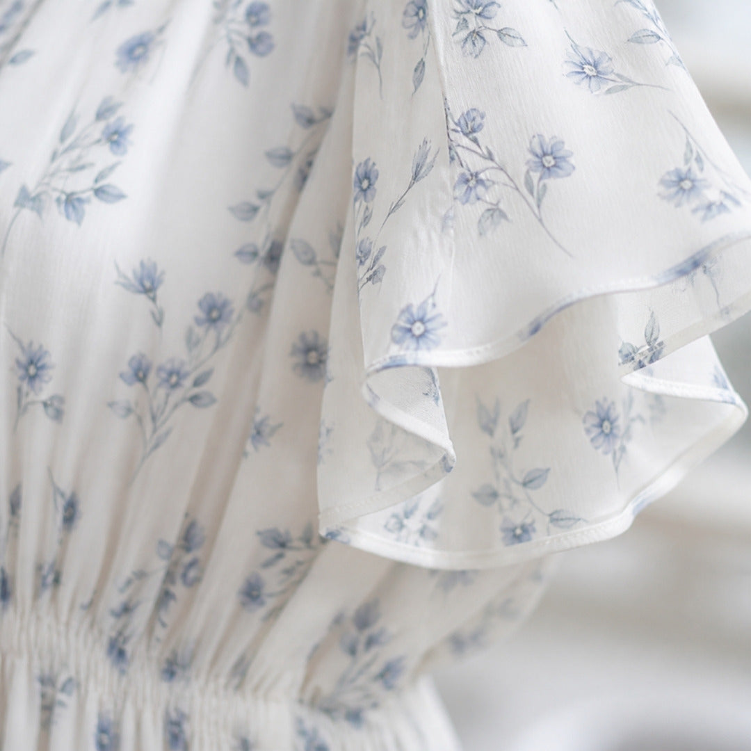 Floral print and flutter sleeve detail